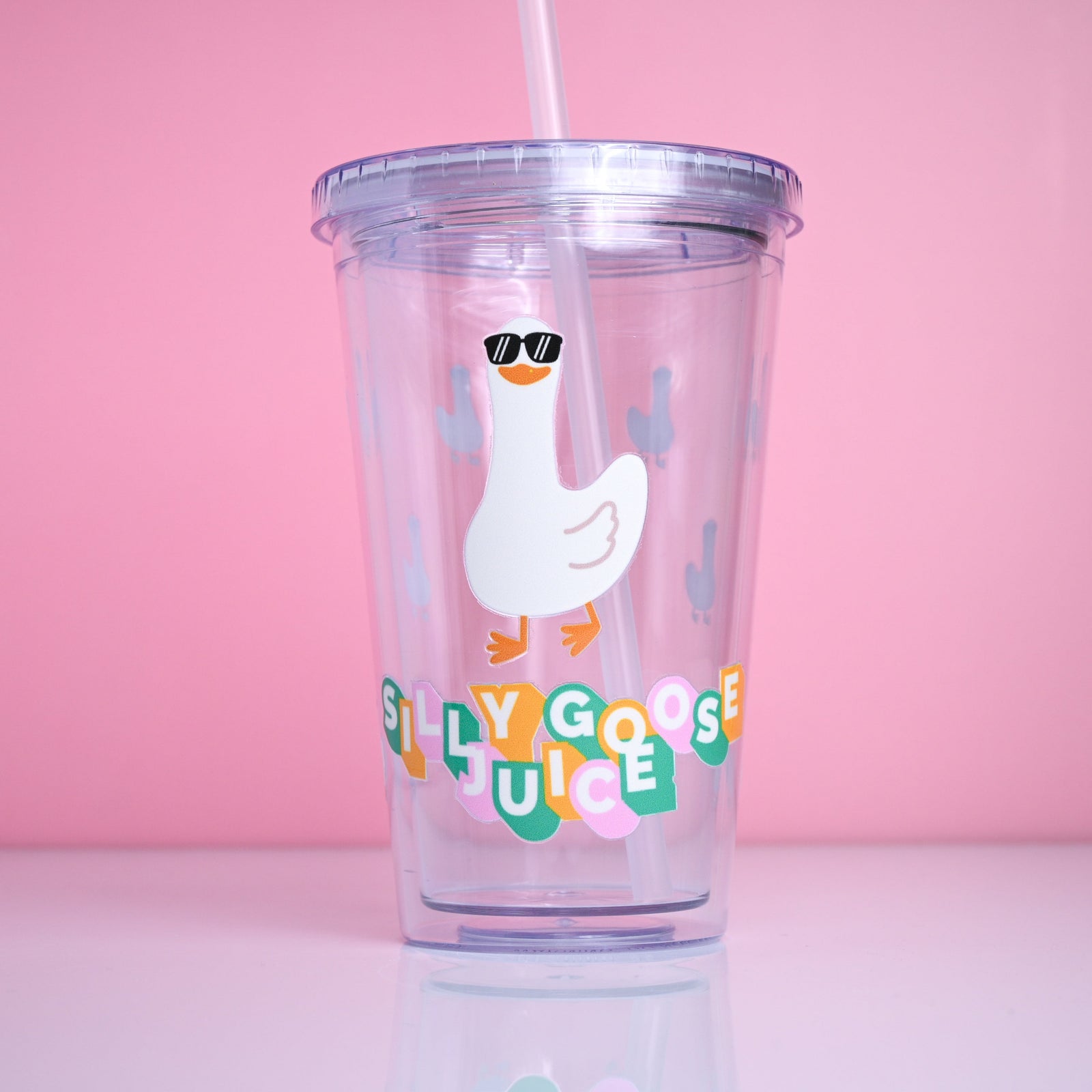 Tumbler with a cartoon goose and 'Silly Goose Juice' text.
