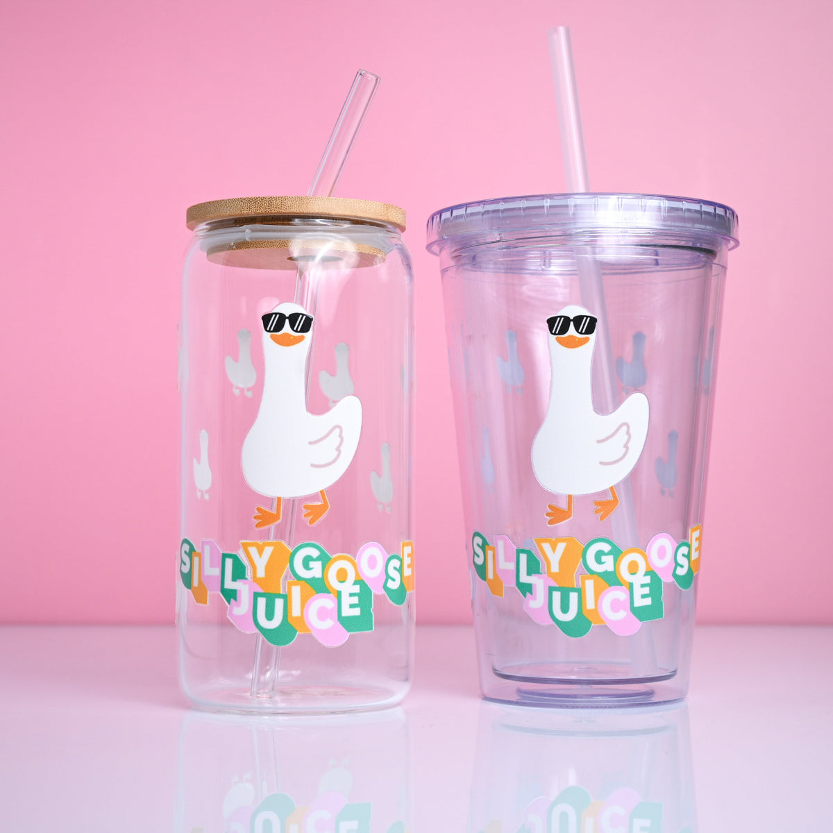 Tumbler with a cartoon goose and &#39;Silly Goose Juice&#39; text.