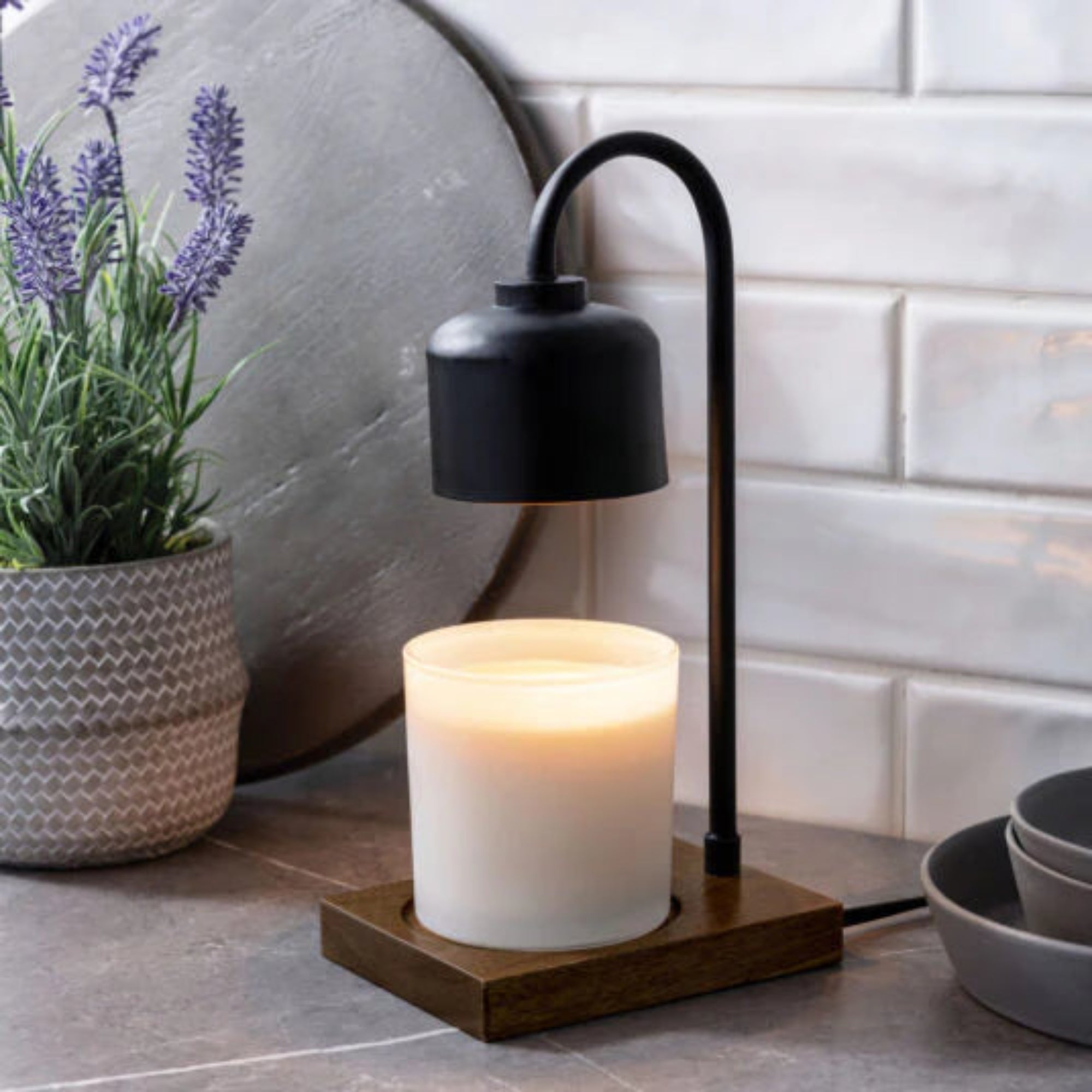 black and wood candle warmer