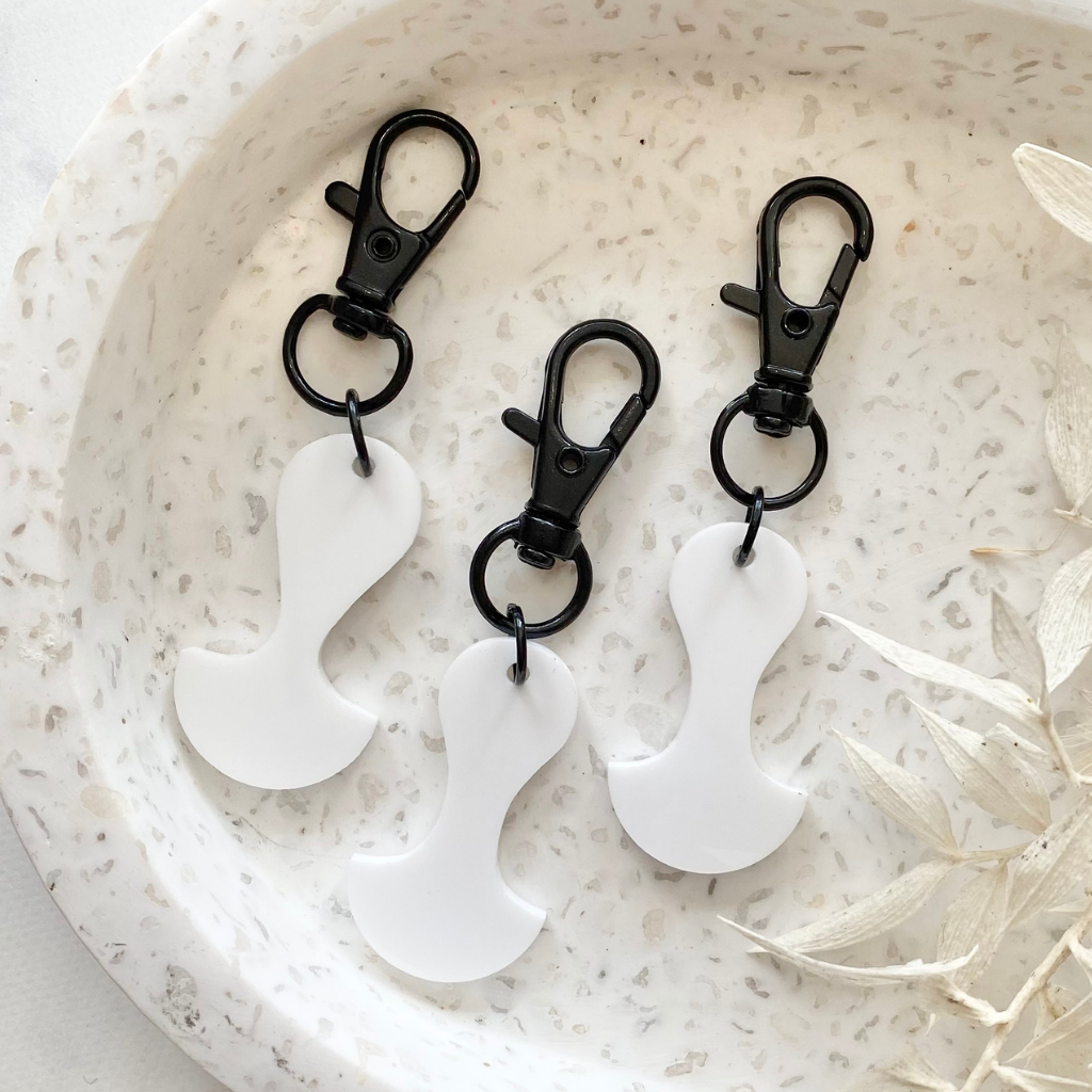 White Trolley Token - A Lil Luxury